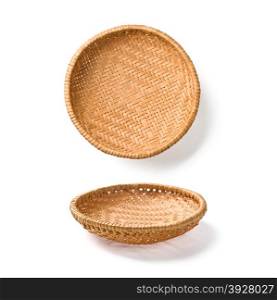 two wicker plates isolated on white background