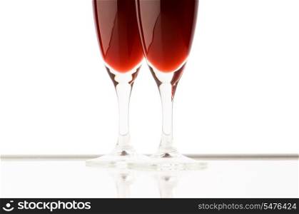 Two wine glasses on the white background