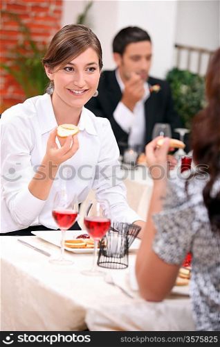 Two woman having lunch together
