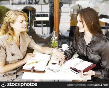 Two women at an outdoor restaurant