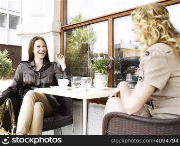 Two women at an outdoor restaurant