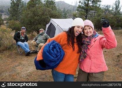 Two women camping, portrait