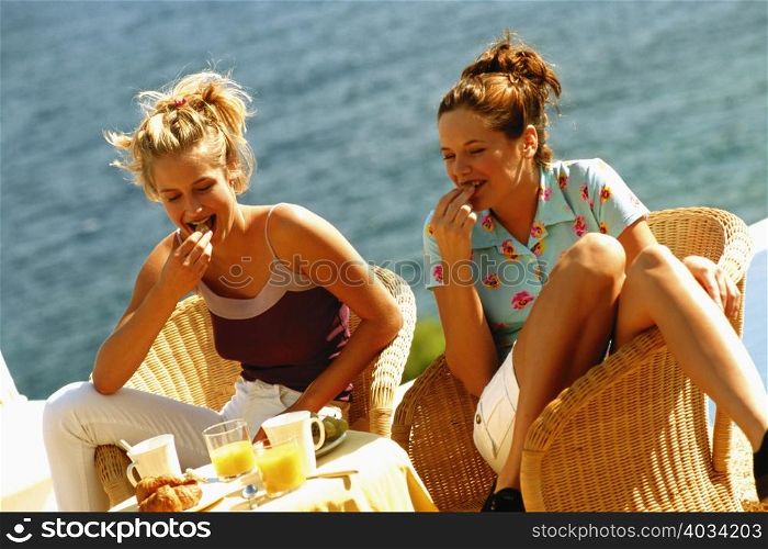 Two women eating