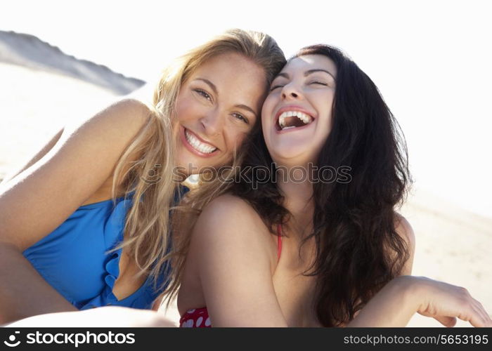 Two Women Enjoying Beach Holiday