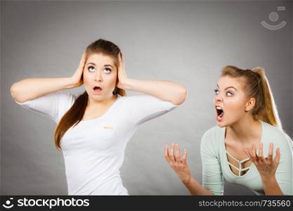 Two women having argue fight being mad at each other. Female telling off, ignorance concept.. Two women having argue