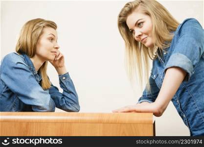 Two women having argue mocking up being mad at each other. Female telling off, ignorance concept.. Two women having argue