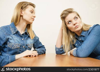 Two women having argue mocking up being mad at each other. Female telling off, ignorance concept.. Two women having argue fight