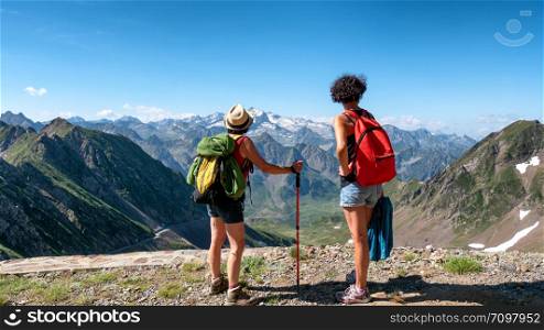 two women hikers on the trail of the Pic du Midi de Bigorre in the Pyrenees