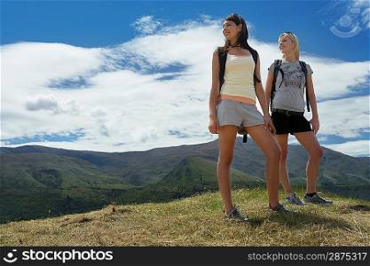 Two women hiking in hills