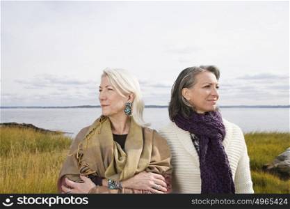Two women near a lake