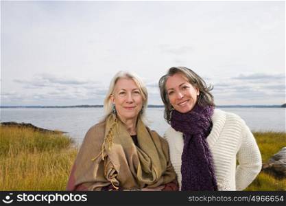 Two women near a lake