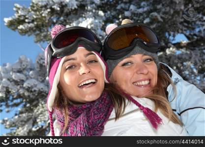 Two women ready to ski