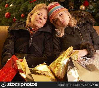 Two Women Returning After Christmas Shopping Trip