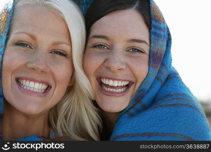 Two women smiling, portrait