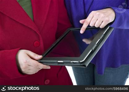 Two women with a digital tablet, detail