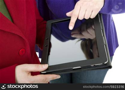 Two women with a digital tablet, isoated, detail