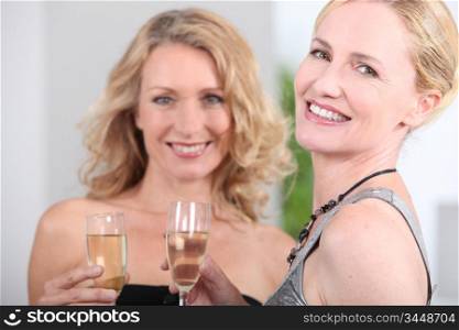 Two women with champagne flutes
