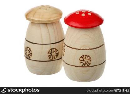 Two wooden saltcellars-pepperboxes are isolated on a white background