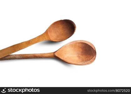 Two wooden spoons isolated on white background