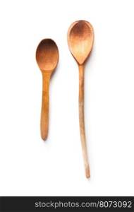 Two wooden spoons isolated on white background