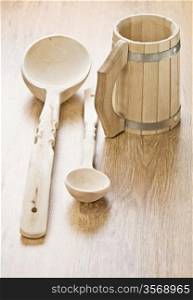 two wooden spoons with mug