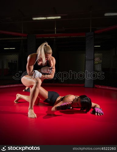 Two wrestler woman at gym