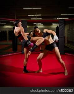 Two wrestler woman at gym