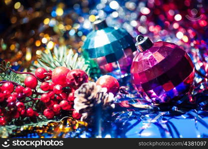 two xmas balls of red and blue color