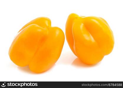 Two yellow pepper on white background