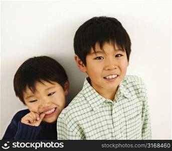 Two young Asian brothers portrait.