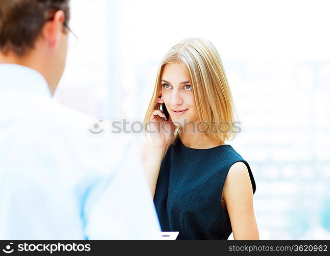 Two young business collegue working together in office