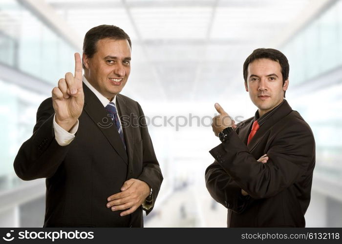 two young business men portrait at the office