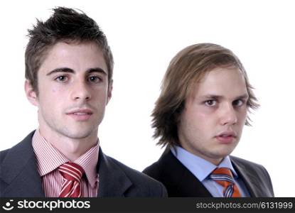 two young business men portrait on white. focus on the man of the left