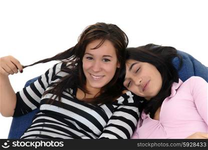 two young casual girls portrait in studio