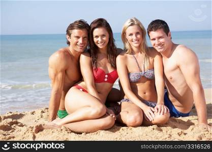 Two young couples on beach holiday