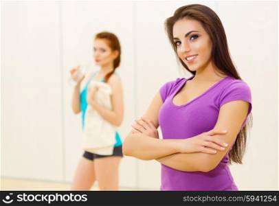 Two young girls at fitness club
