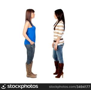 Two young girls face to face on white background