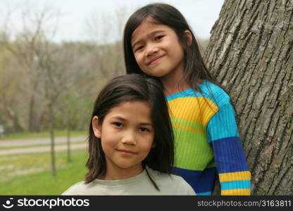 Two young girls outside