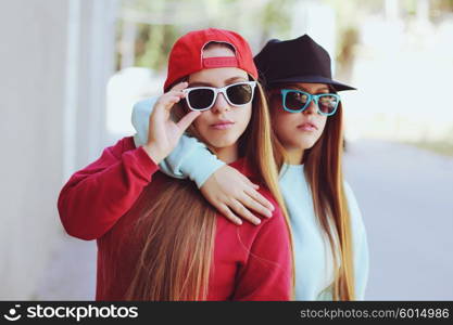 Two Young Hip Girls posing together