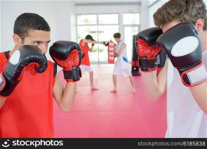 Two young men boxing