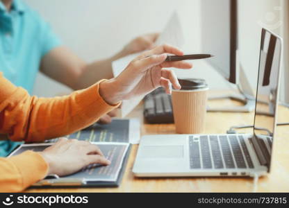 two young programmer working with data code in software development company office.