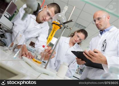 two young scientist doing experiments in lab