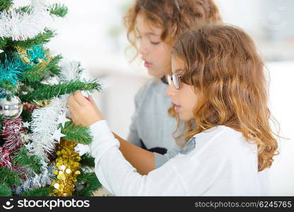 Two young sisters at Christmas