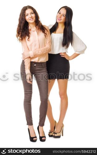 Two young smiling girls isolated