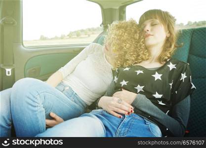 Two young woman doing together a road trip