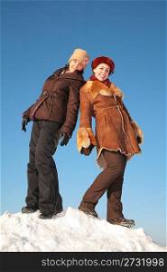 two young woman posing on snow hill 2
