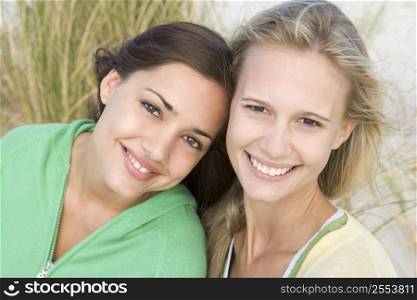 Two young women posing outdoors