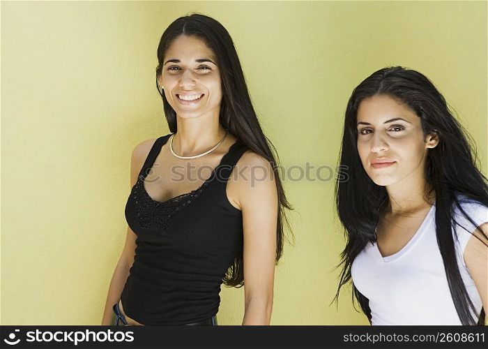 Two young women with long hair