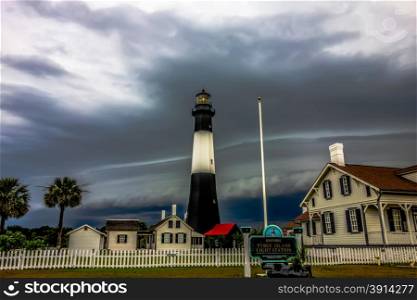 tybee island beach lighthouse with thunder and lightning