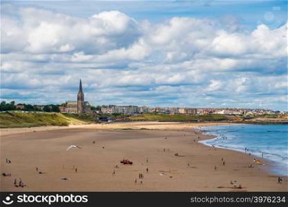 Tynemouth, England - August 2, 2018: Tynemouth Coastline with St George&rsquo;s Church in the background